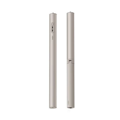 A sleek, metallic silver cylindrical device shown in two views against a solid white background, likely a modern electronic pen or personal care device.