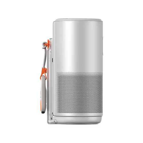 A silver cylindrical portable projector with a perforated front grille and an orange-and-gray carrying strap attached to the side, shown on a plain white background.