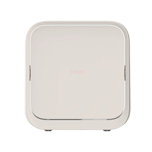 White portable Ximi projector device with a camera lens on a white background
